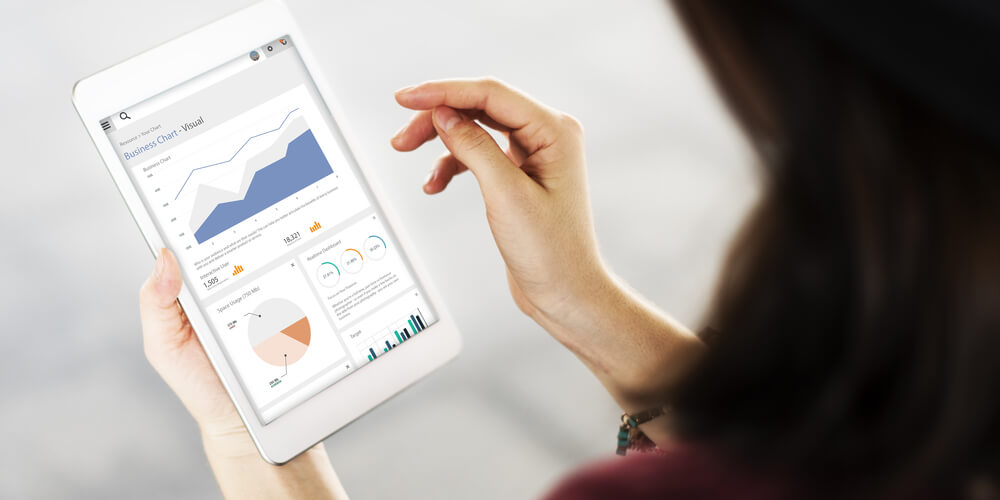 Zen Dental Marketing ZDM specialist looking at social media dashboard