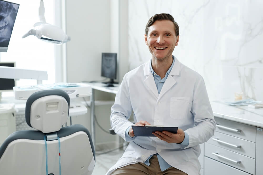 portrait of male Zen Dental Marketing client dentist smiling at camera